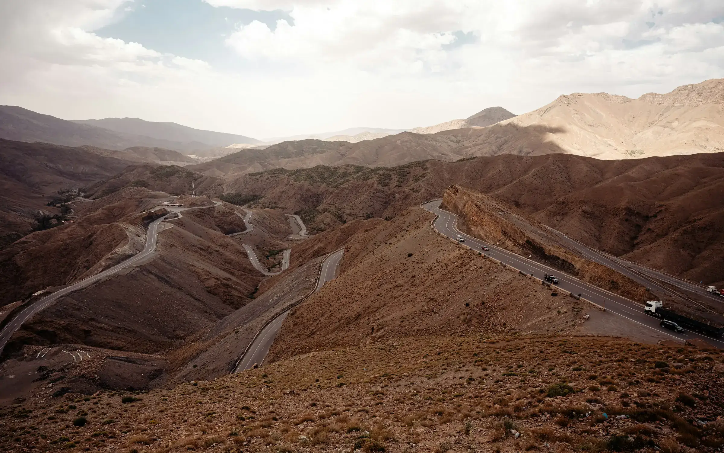 Switchback roads climbing through the High Atlas mountains of Morocco